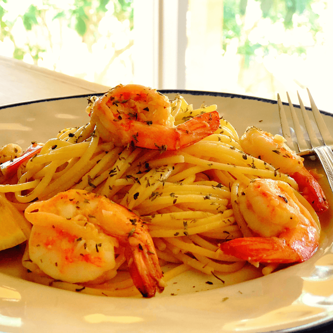 A beautifully plated of shrimp pasta