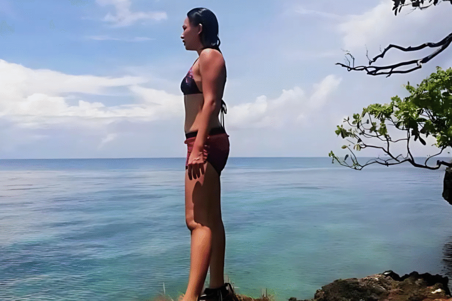 A mom standing on top of a cliff, wondering Why the transition of motherhood is hard