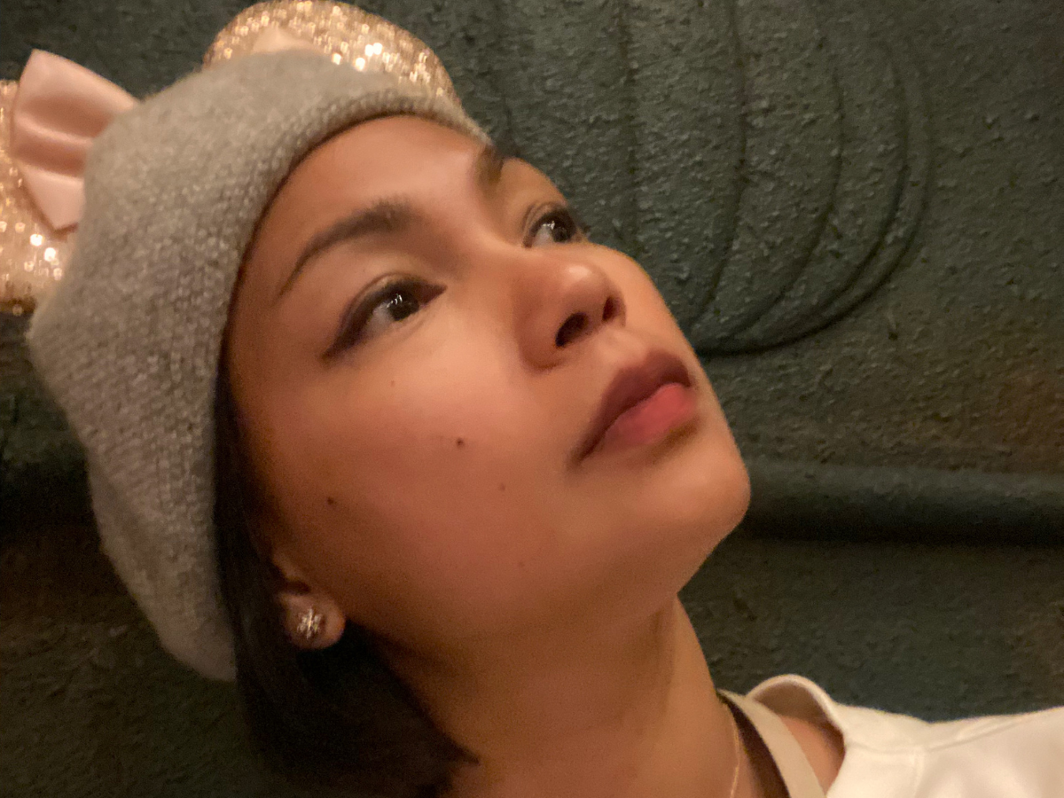 A mom reflecting during a quiet moment alone, symbolizing finding yourself after motherhood.