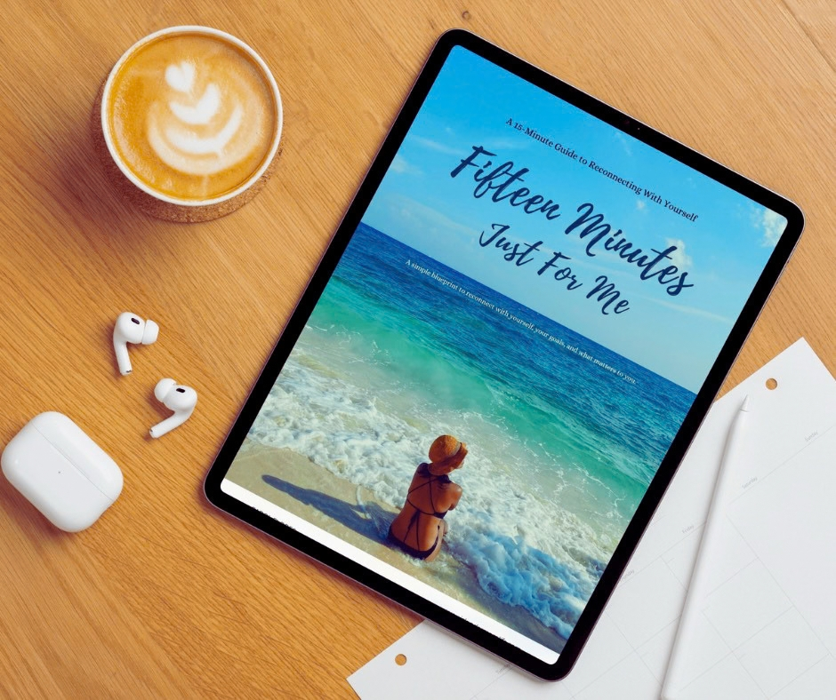 An ipad on the table with Fifteen Minutes Just For Me ebook on the screen from IslanderMomLife